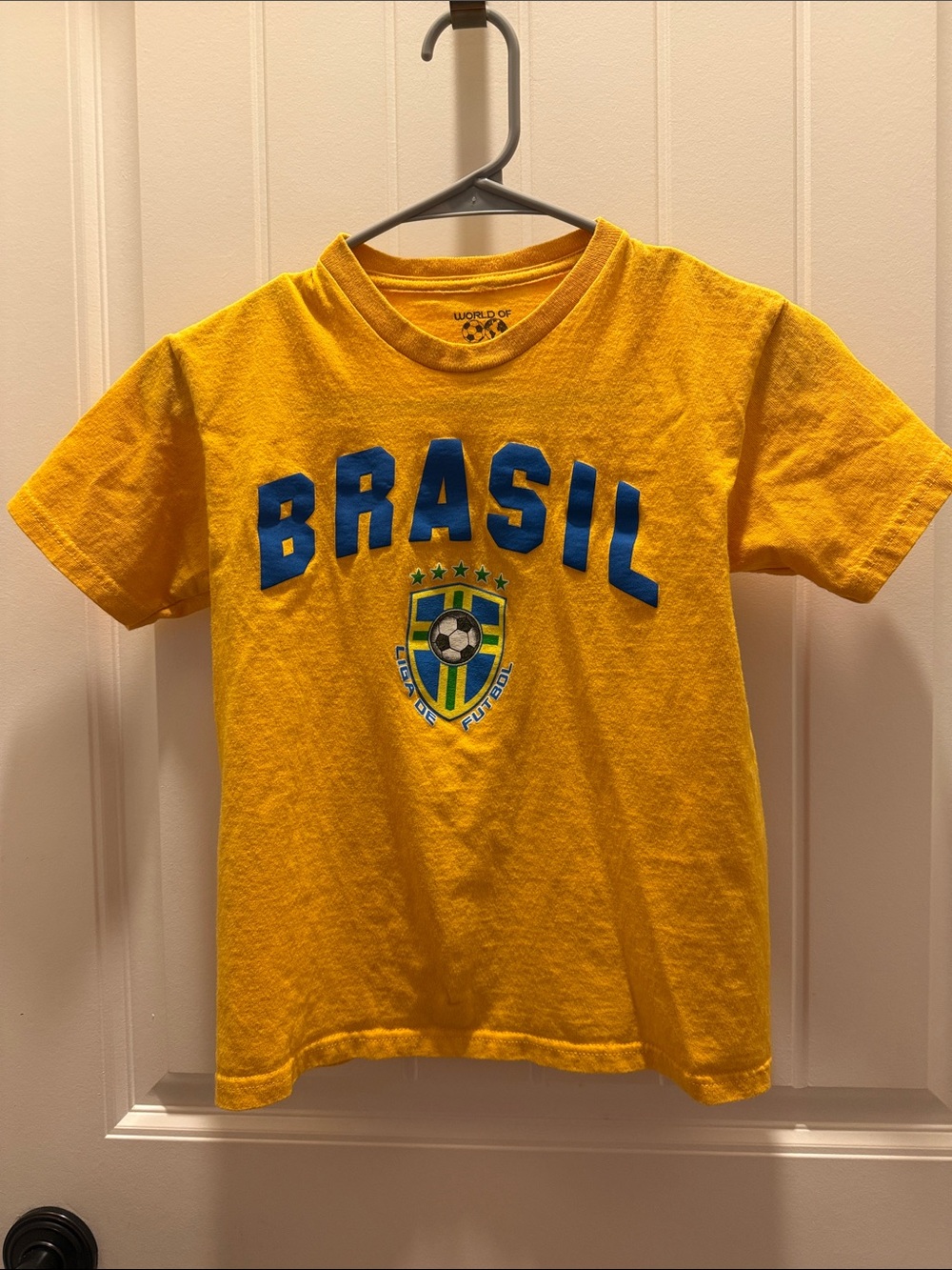 World of Soccer Brasil Liga de Futbol Yellow with Navy Kids Soccer Tee (S/8)